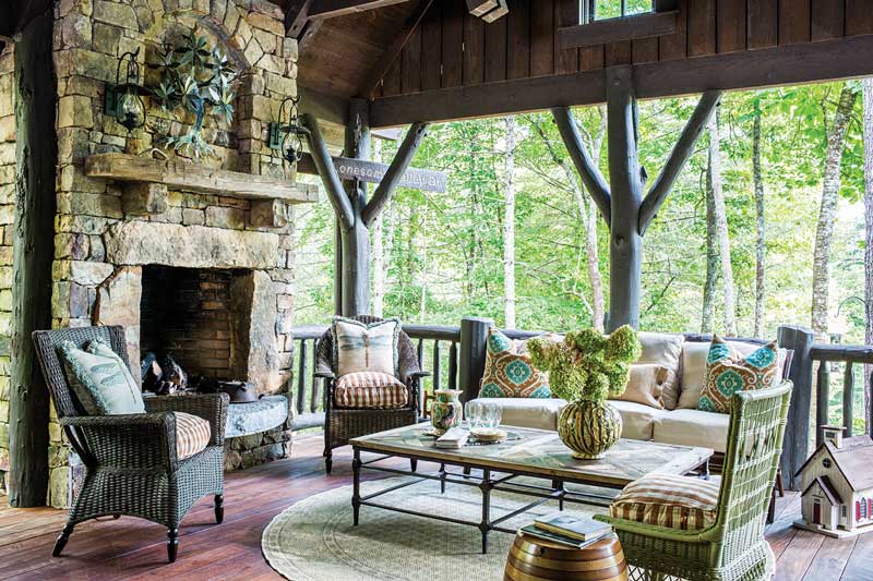 Outdoor seating and fireplace in the mountains