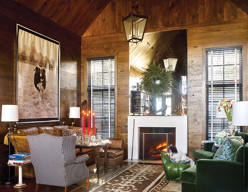 wood-paneled living room with fireplace