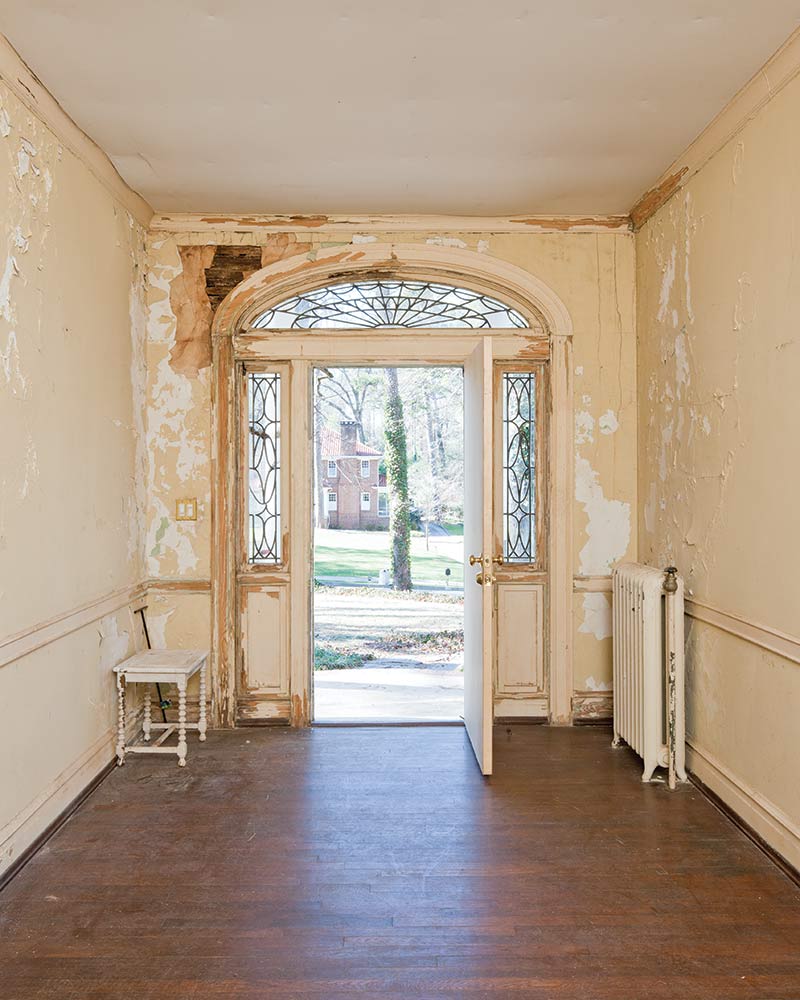 dilapidated colonial style foyer