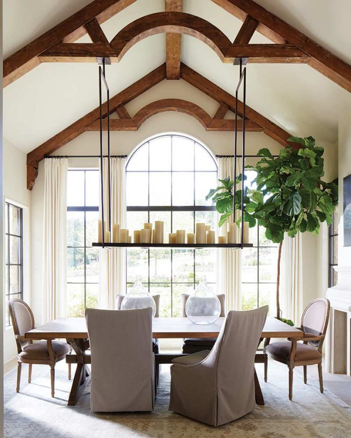 wood beams and vaulted ceiling in dining room