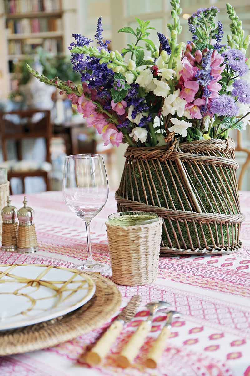 pink and wicker table setting